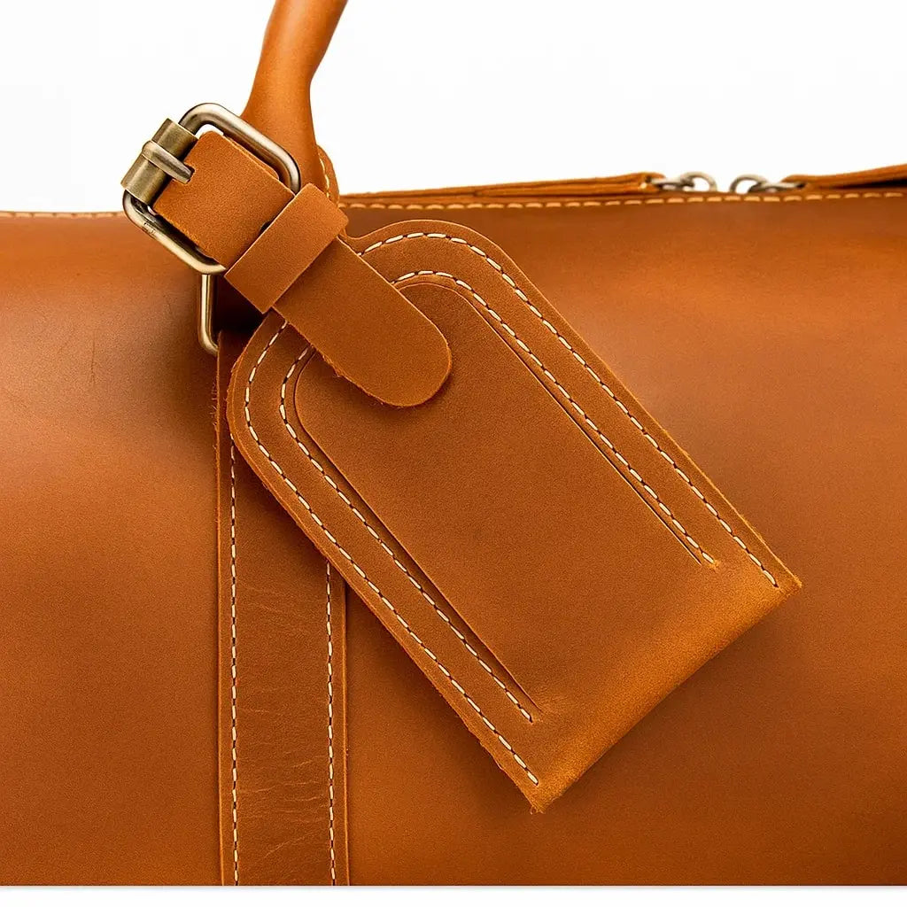 Grand sac de voyage en cuir vintage, robuste et tendance pour courts séjours et escapades