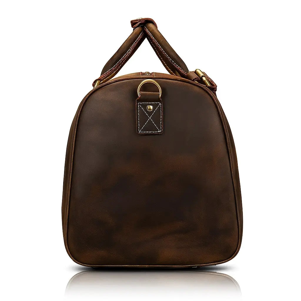 Grand sac de voyage en cuir marron foncé, élégant et pratique pour homme ou femme en déplacement